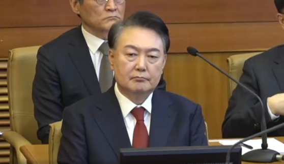 윤석열 대통령이 11일 헌법재판소에서 열린 본인의 탄핵심판 7차 변론에 피청구인으로 출석한 모습.(사진=헌법재판소 제공)